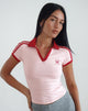 Immagine di Isda Top in rosa femminile con fiocco rosso Emb