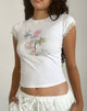 Immagine di Izzy Top in bianco con mazzo di fiori