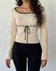 Immagine di Juhye - Top a manica lunga in maglia beige con rilegatura nera