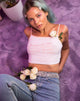 Immagine di Kamla Crop Top in bianco con rose rosse e testo X Top ragazza