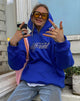 Immagine della felpa con cappuccio oversize in Cobalt It Just Hits Different Embro
