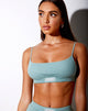 Immagine di Esme Bralet in color verde mare con ricamo a forma di angelo bianco
