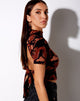Immagine di Que Backless Top in tonalità arancione Dragon