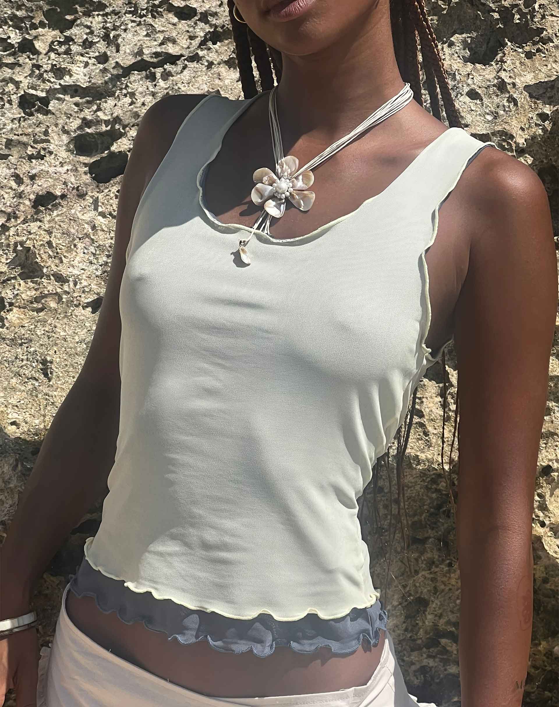 Immagine di Zeta Gilet Top in giallo con fodera blu