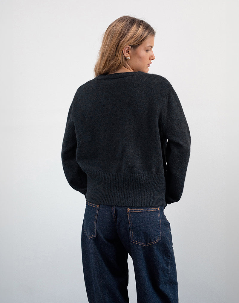 Immagine di Acera Cardigan in maglia nera con bottoni a fiore d'argento