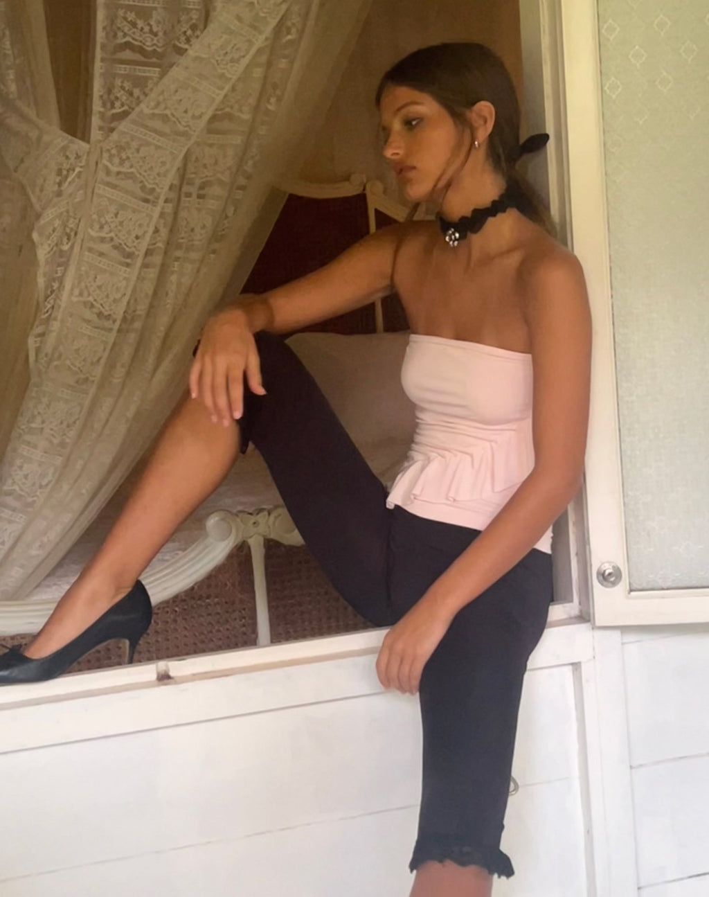 Top a fascia con volant di Baylin in rosa baby