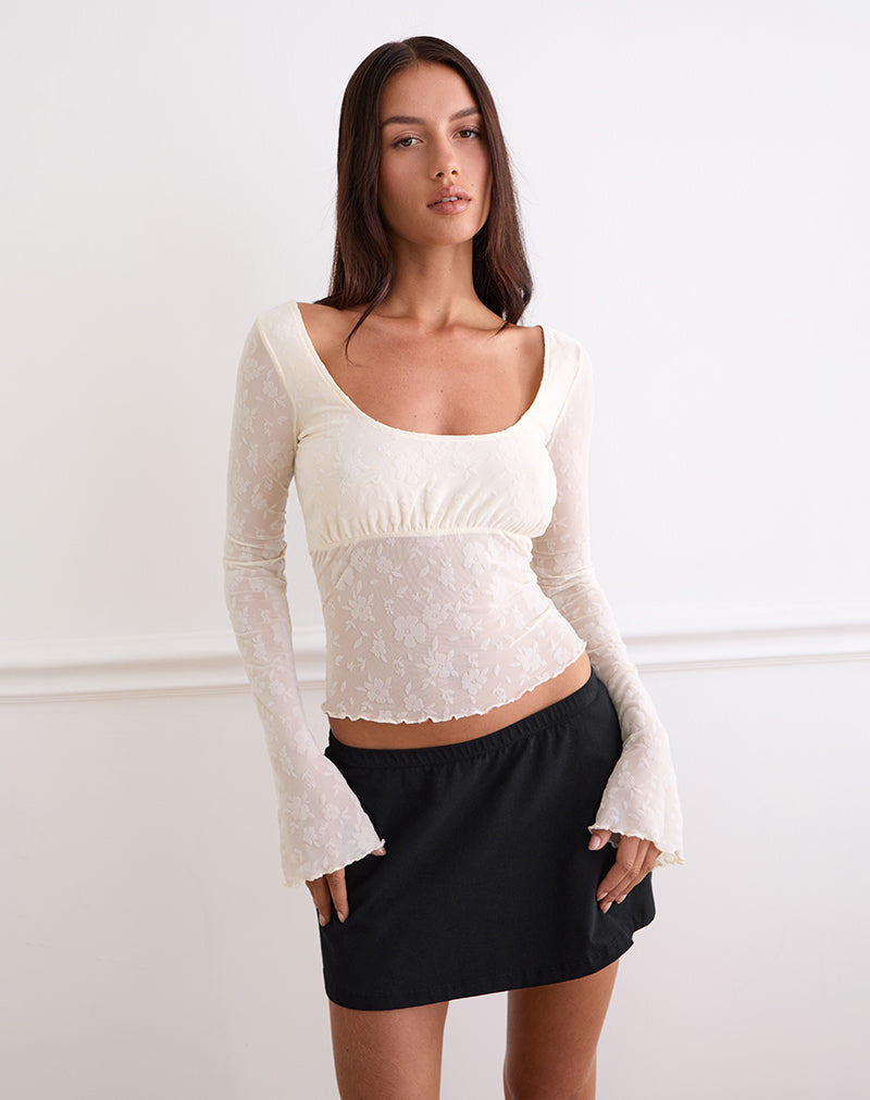 Top Aqsa a maniche lunghe in flock floreale crema