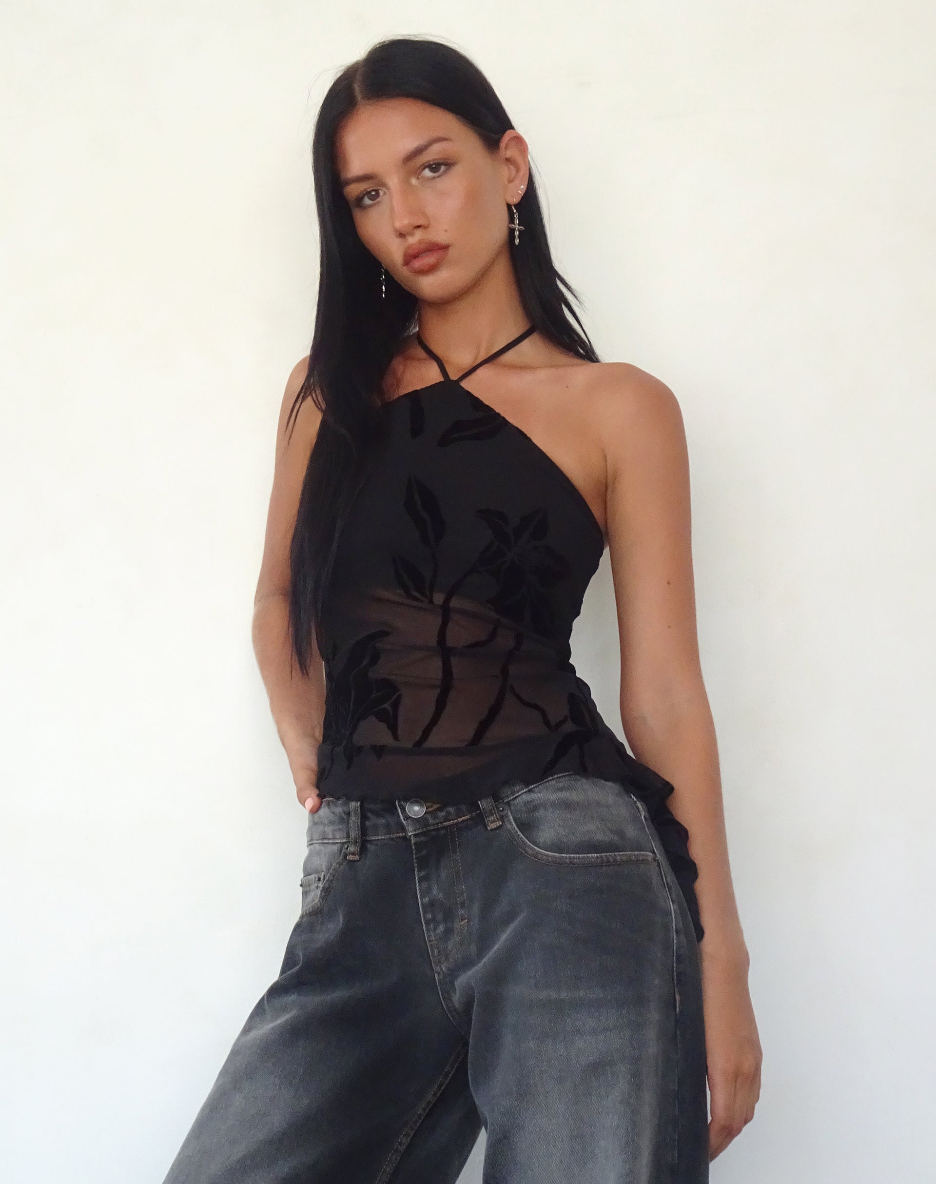 Immagine del top Arabella con collo alto in Orchidee Flock Nero