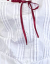 Popeline bianco con finiture rosse