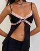 Immagine di Ariela Butterfly Top nero con pizzo rosa