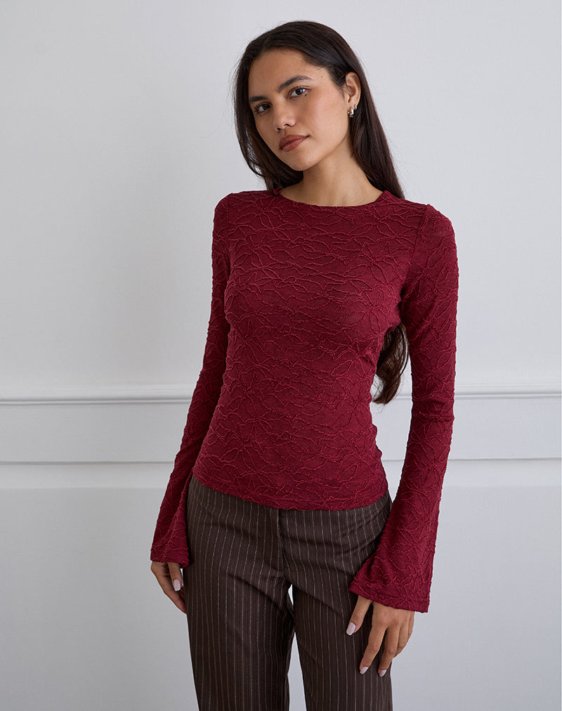 Top asimmetrico Aven in maglia testurizzata rossa