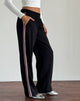 Immagine dei pantaloni Bennett in nero con strisce laterali rosa