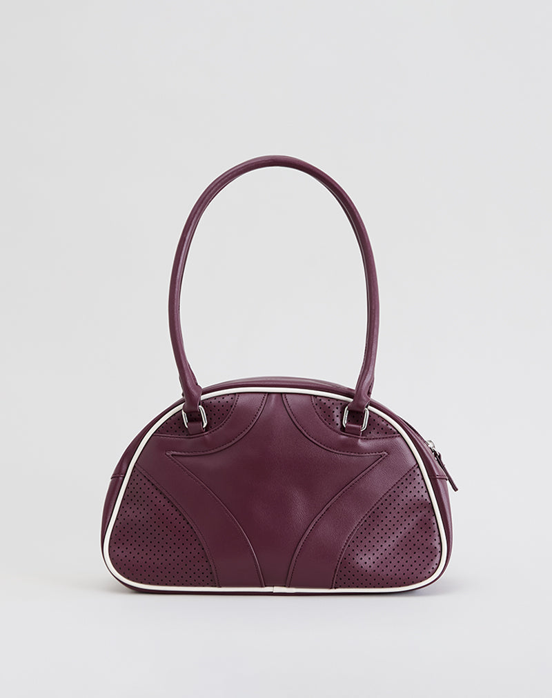 Immagine della borsa bowler in crema e borgogna