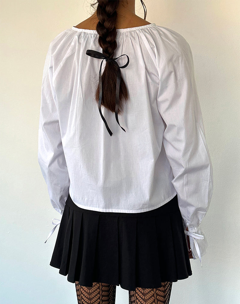 Immagine della blusa Bulila con maniche a cravatta in popeline bianco