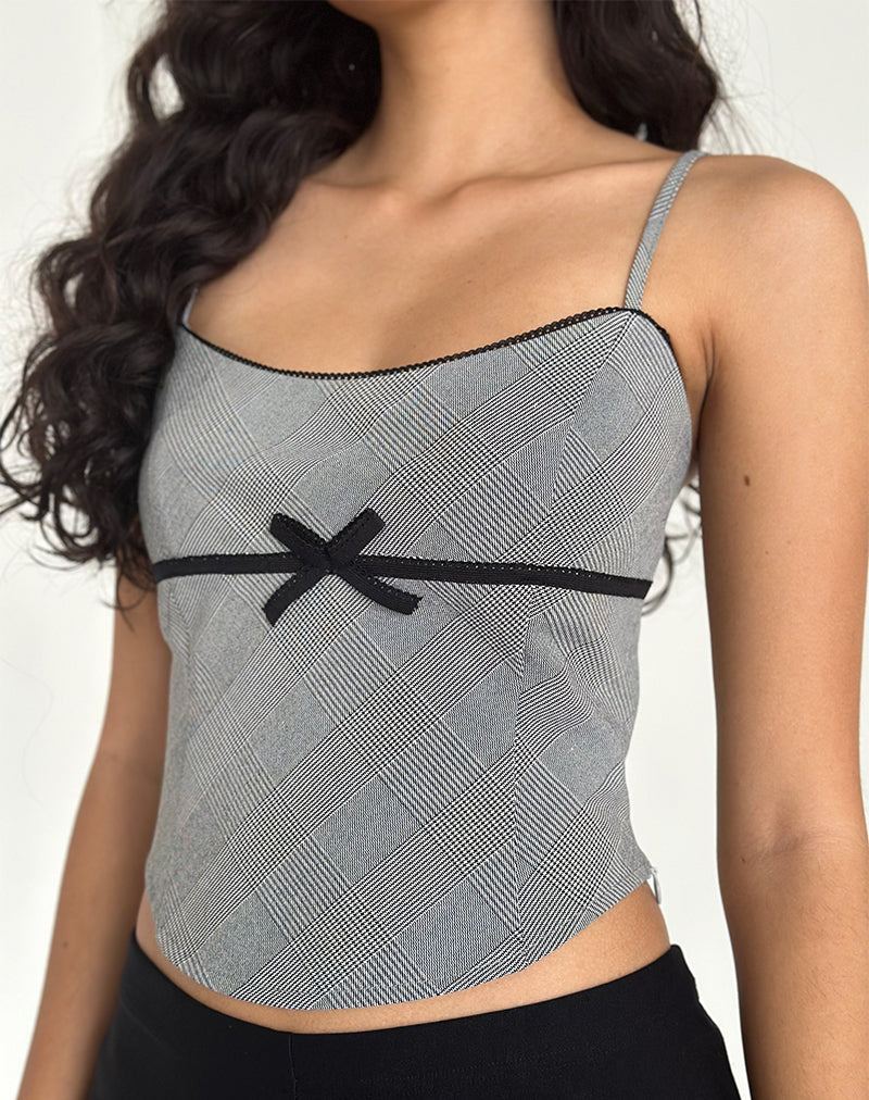 Canika - Top con corsetto a quadri multipli bianchi e neri