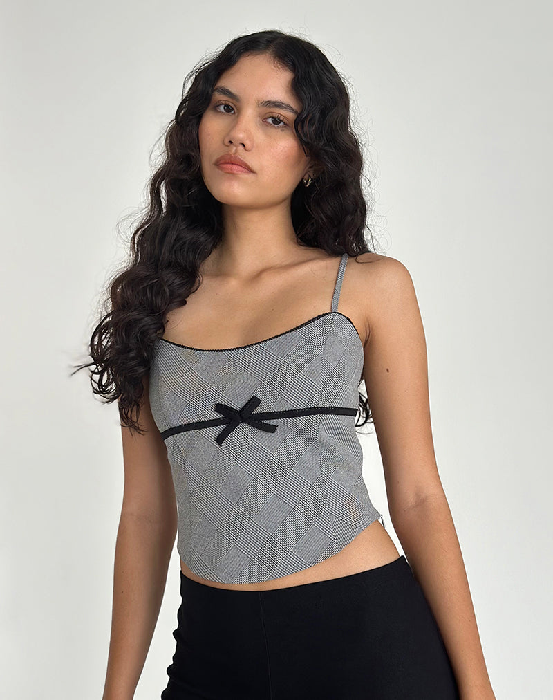Canika - Top con corsetto a quadri multipli bianchi e neri