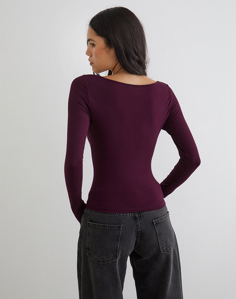 Immagine della maglia a maniche lunghe Donela con anello floreale in legno di sequoia