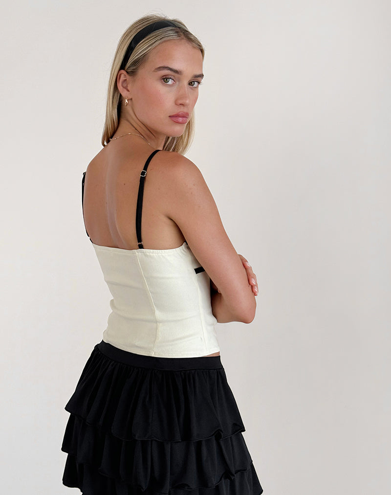 immagine di Duta Cami Top in crema con fiocchi neri