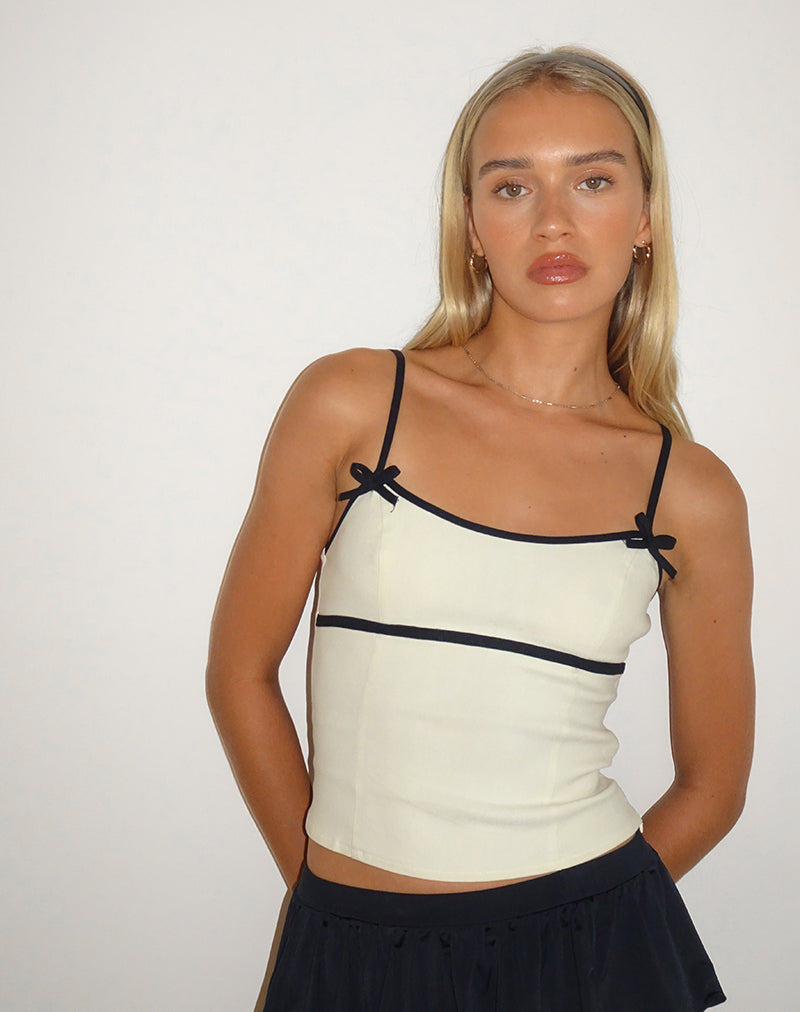immagine di Duta Cami Top in crema con fiocchi neri