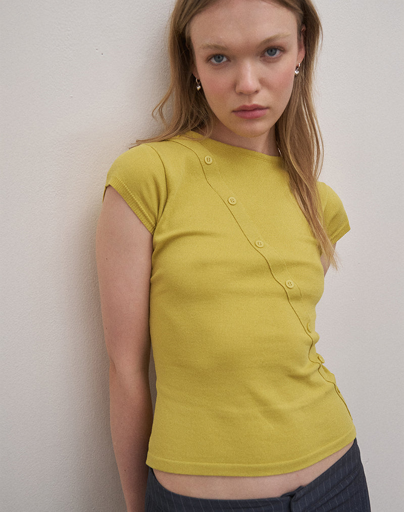 Top asimmetrico Elyra in maglia verde oro