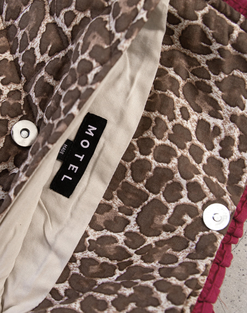 Immagine della borsa per il trucco pieghevole in leopardo con fiocco rosso