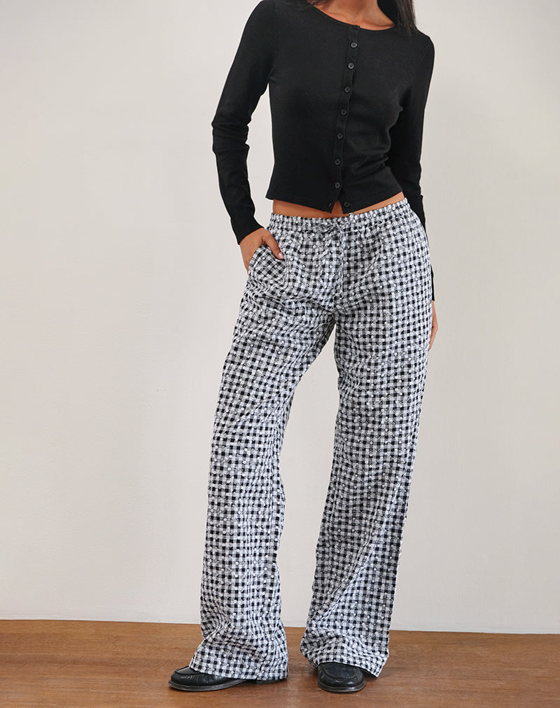 Wasic - Pantaloni in lino a gamba larga con motivo floreale in percalle nero