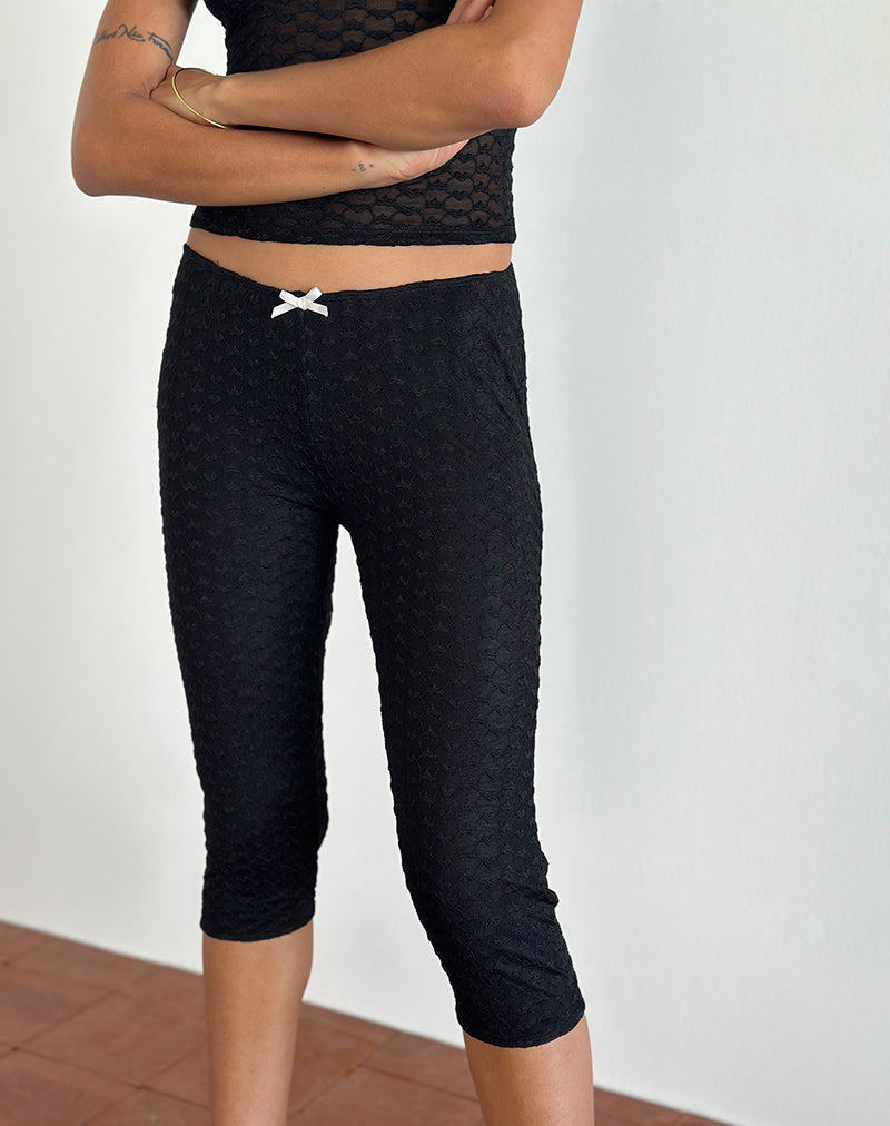 Pantaloni Capri Asih in pizzo nero a cuore