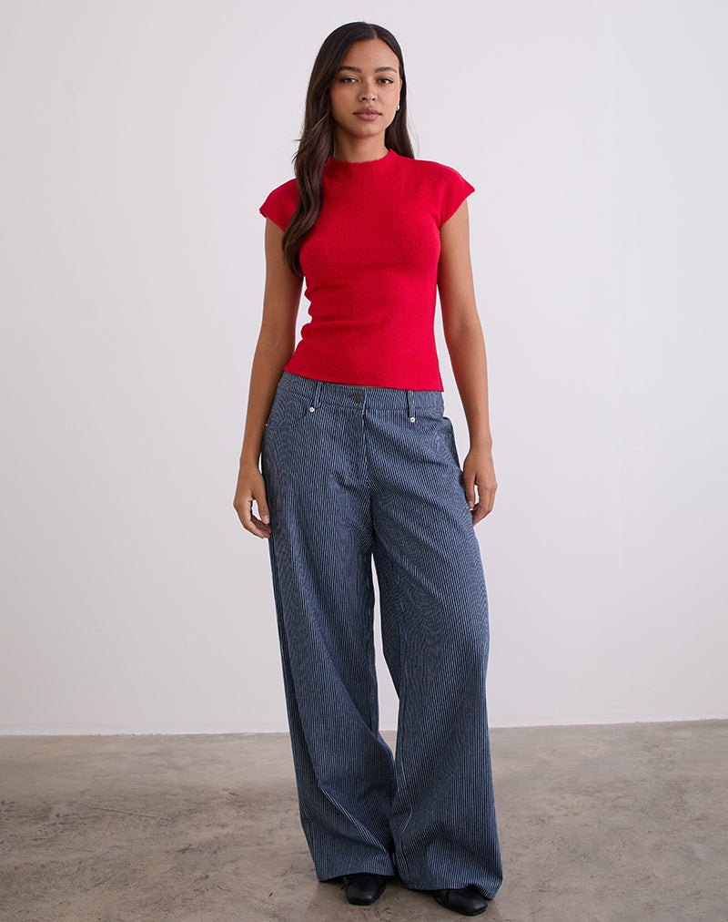 Top Hanuva in maglia rossa