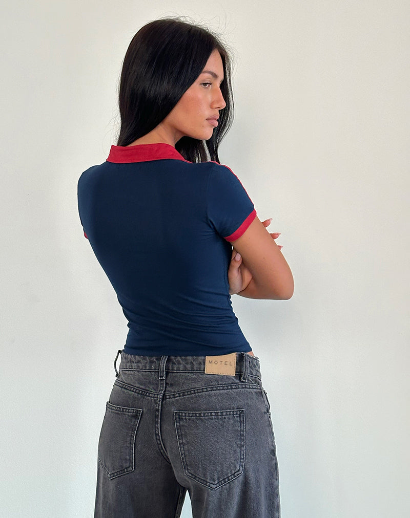 Immagine di Isda Top in Navy con bordatura in rosso Adrenaline e ricamo M