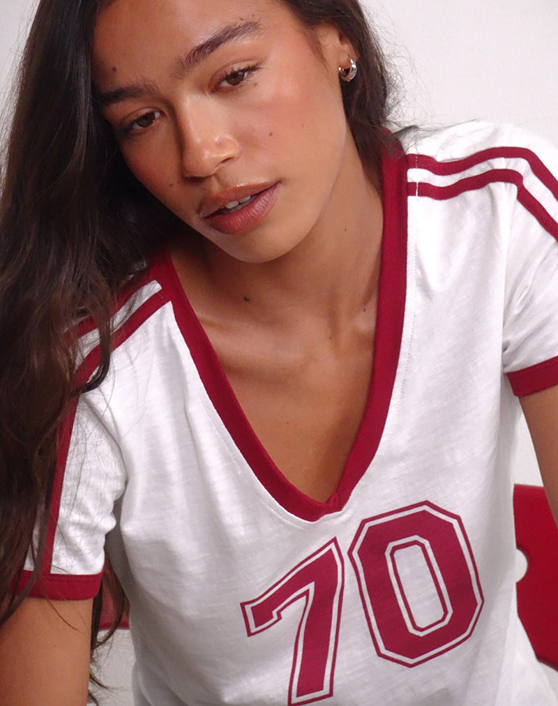 Immagine di Janan Top in bianco sporco con rilegatura rosso Adrenalina