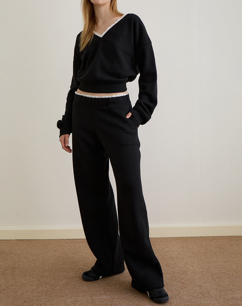 Immagine di Jenita Loose Jogger in nero con finiture in picot bianco