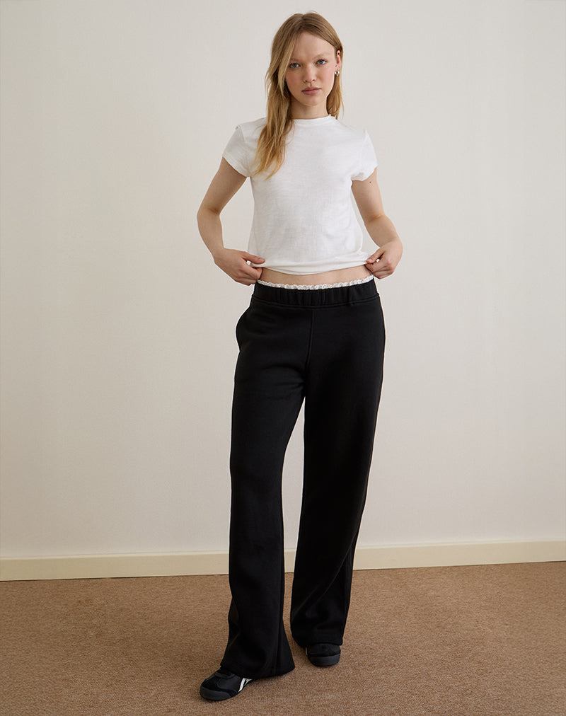 Jenita Loose Jogger in nero con finiture in picot bianco