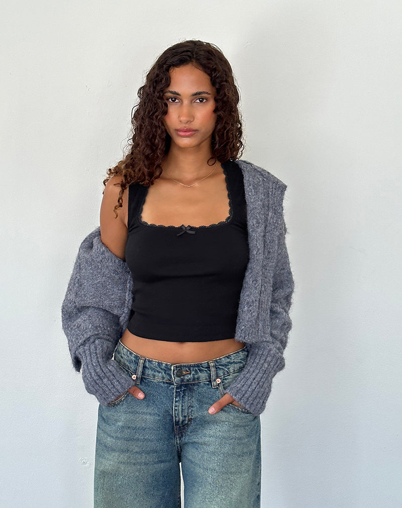Top Jinila nero con pizzo e fiocco