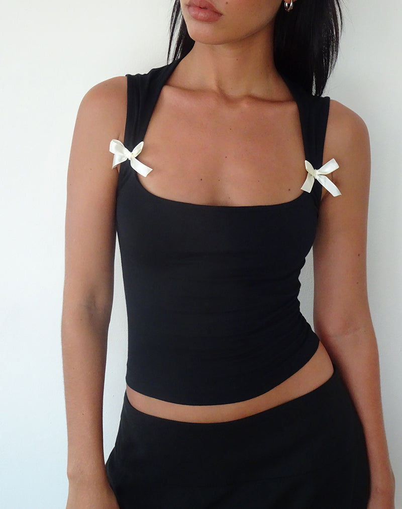 Immagine di Jiniso Crop Top nero con fiocchi avorio