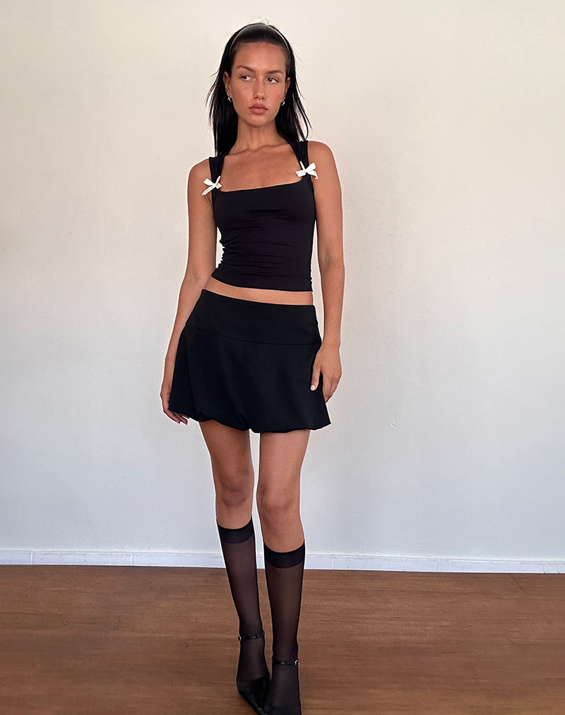 Immagine di Jiniso Crop Top nero con fiocchi avorio