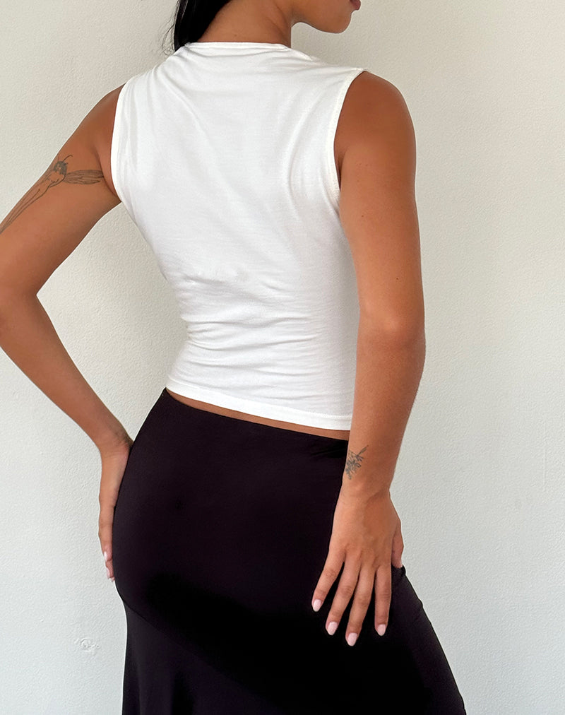 Immagine di Jiniso Crop Top in bianco sporco con fiocchi neri