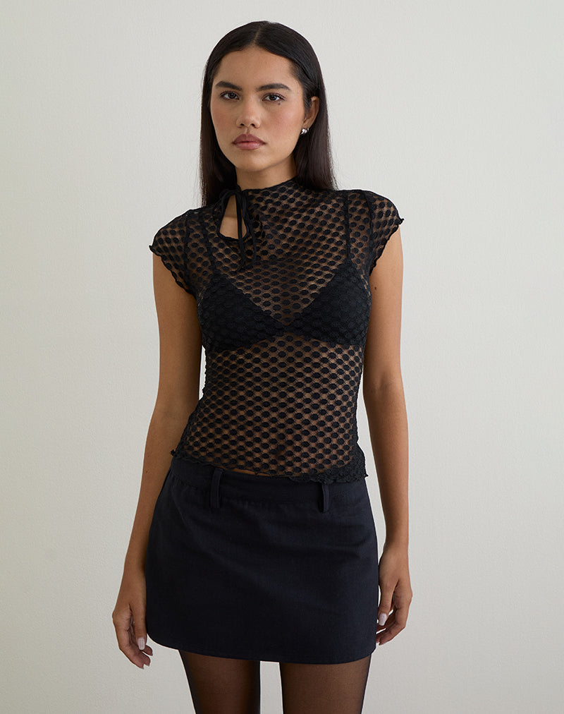 Top con buco della serratura Jiwon in pizzo a pois nero