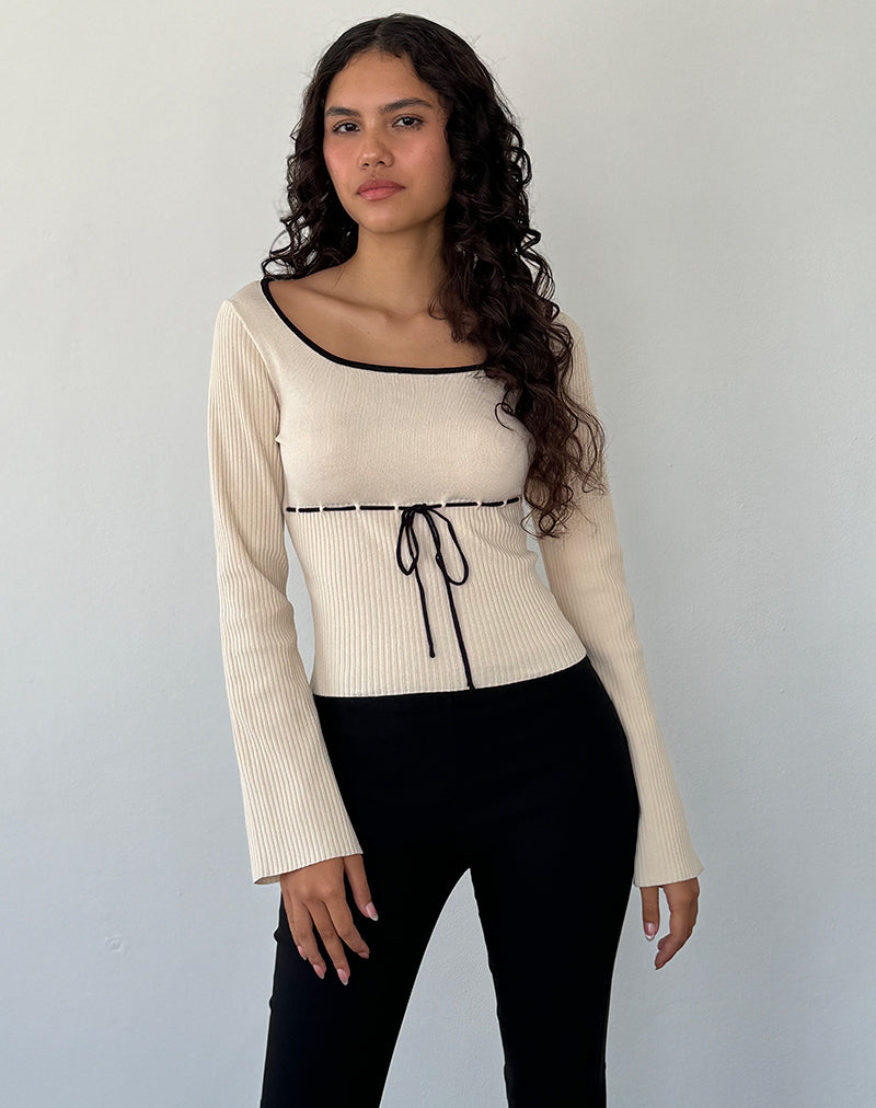 Immagine di Juhye - Top a manica lunga in maglia beige con rilegatura nera