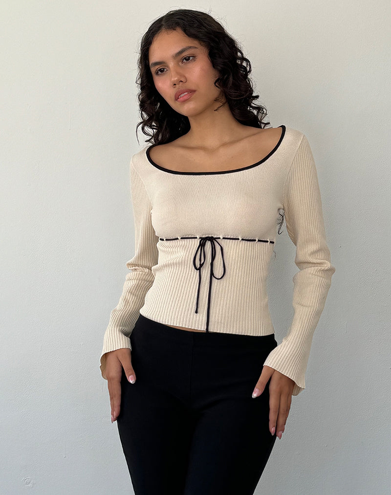 Juhye - Top a manica lunga in maglia beige con bordatura nera
