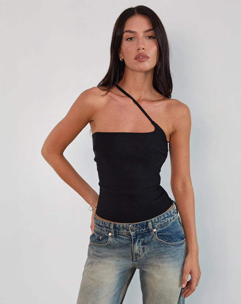 Top asimmetrico Kacya in nero con fibbia