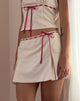 Immagine di Idalis Skort in crema con rilegatura rossa
