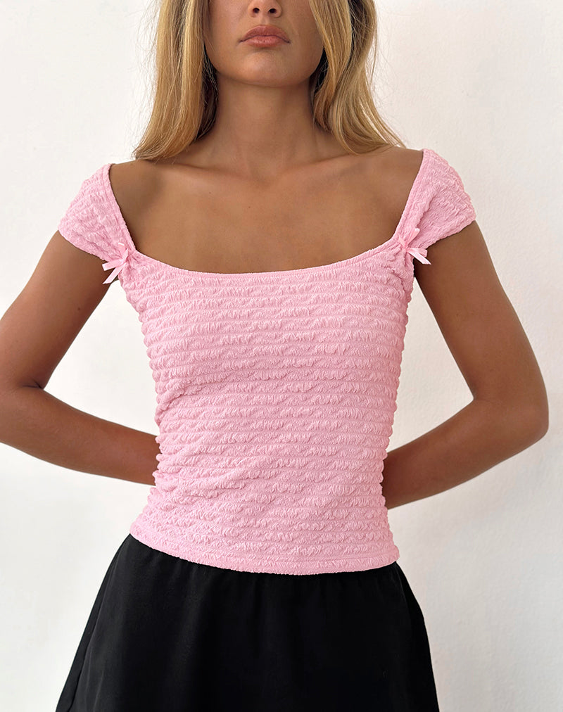 Top con fiocco Kalisa in rosa testurizzato