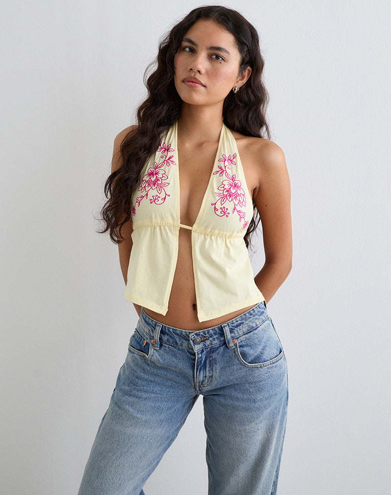Top a cravatta Kayria in limone con ricamo floreale rosa