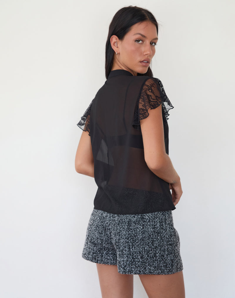 Immagine della blusa Lada in chiffon nero con rifiniture in pizzo