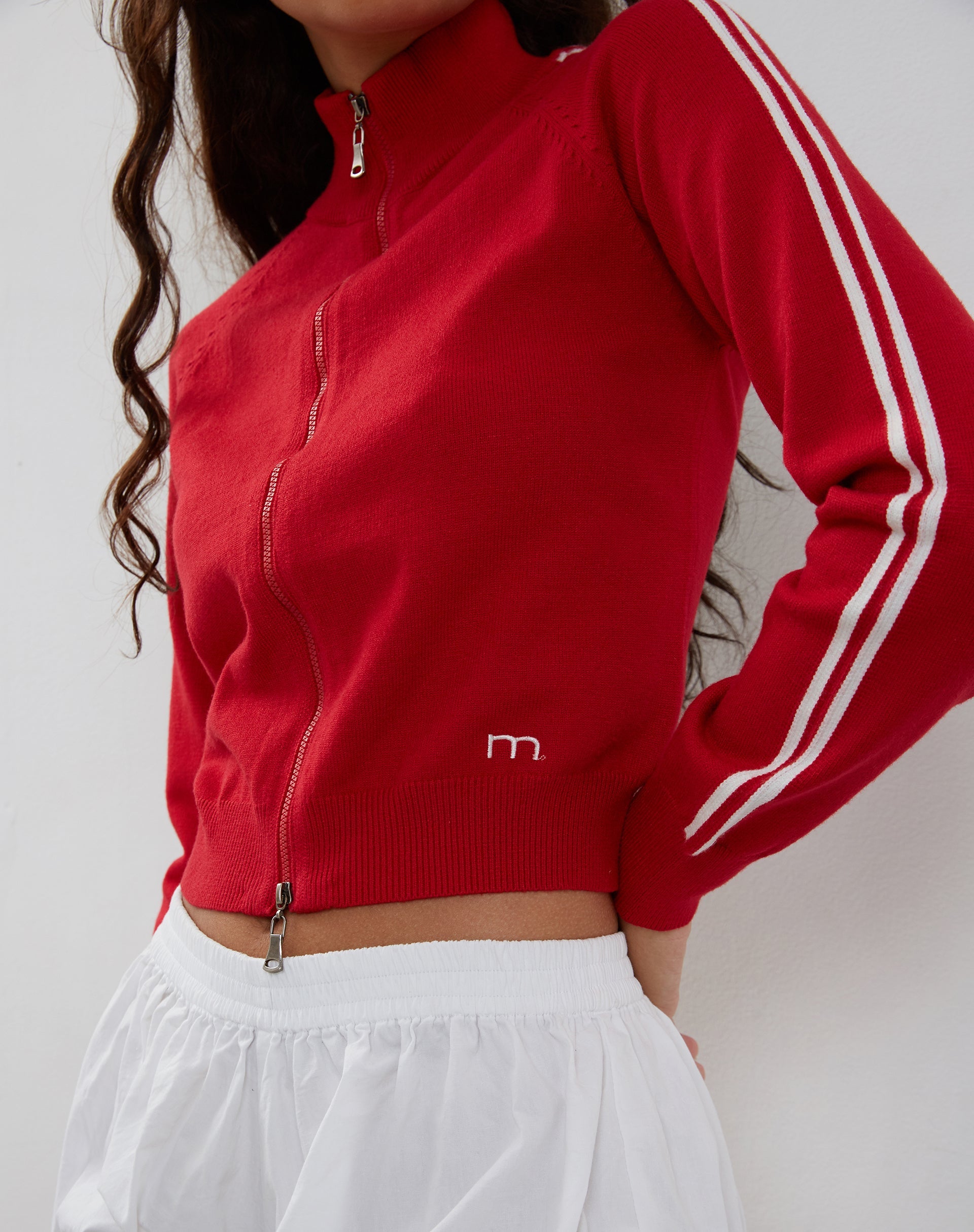 Immagine di Lennon Zip Up Jacket in rosso con strisce bianche laterali