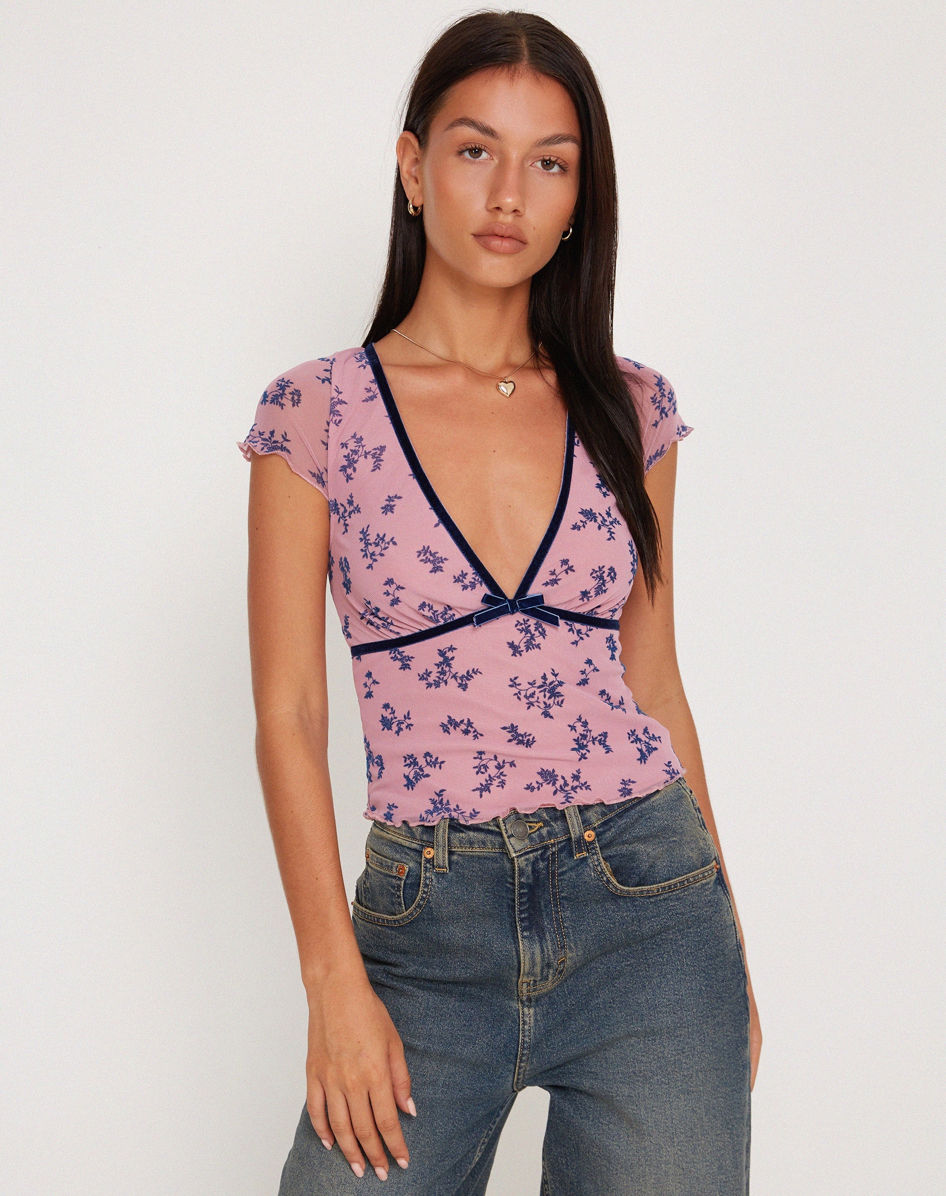 Immagine del top a rete Livi in rosa e marina con floccatura botanica