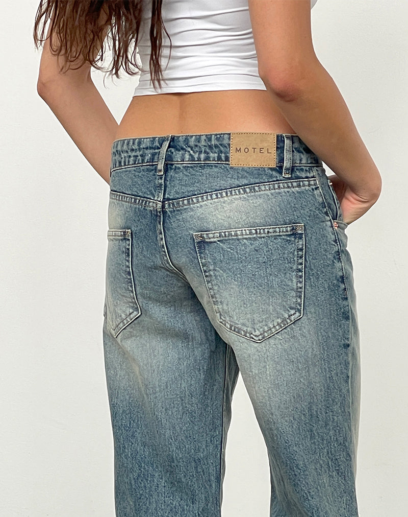 Immagine dei jeans paralleli a vita bassa in blu sporco