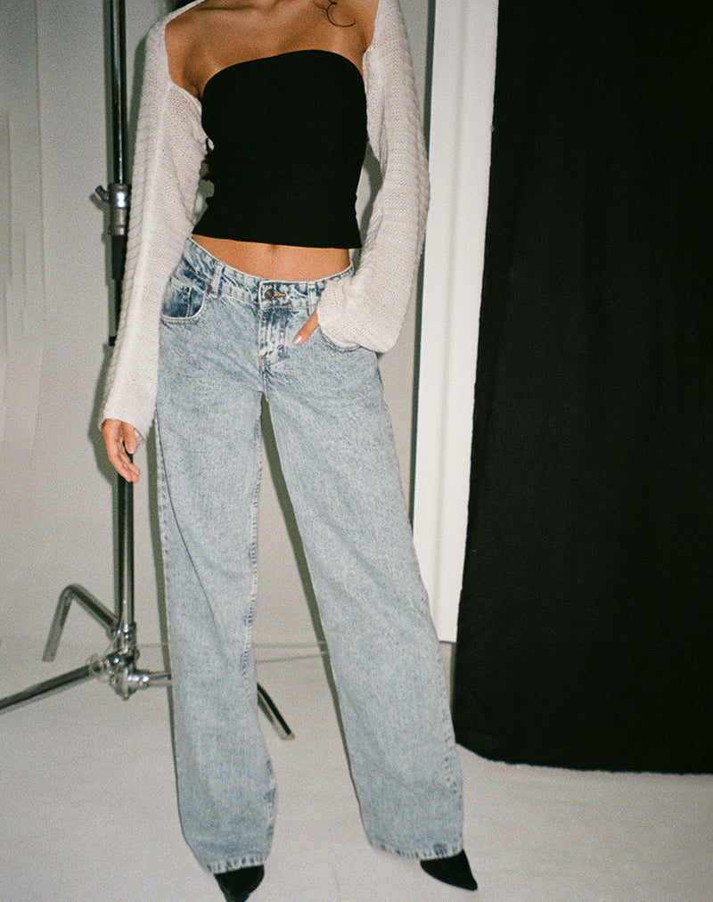 Immagine dei jeans paralleli a vita bassa con lavaggio blu chiaro anni '80
