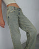 Immagine dei jeans paralleli a vita bassa in blu sabbia acido