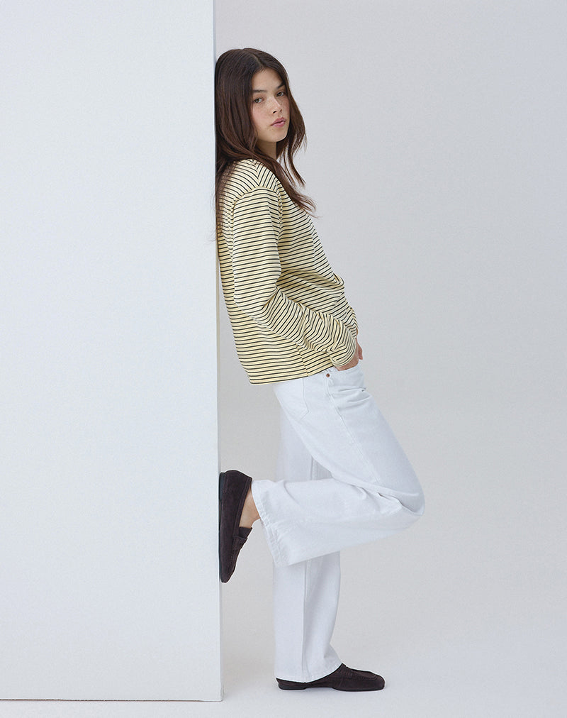 Immagine dei jeans paralleli a vita bassa in vero bianco